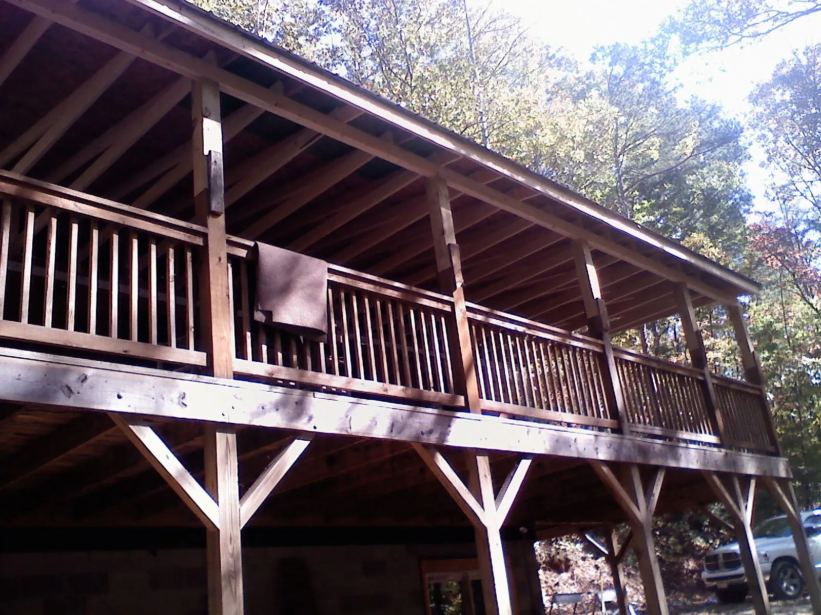 Timber framing under a new elevated porch and deck — Roof Leak Repair in Lind by Roofing Brothers
